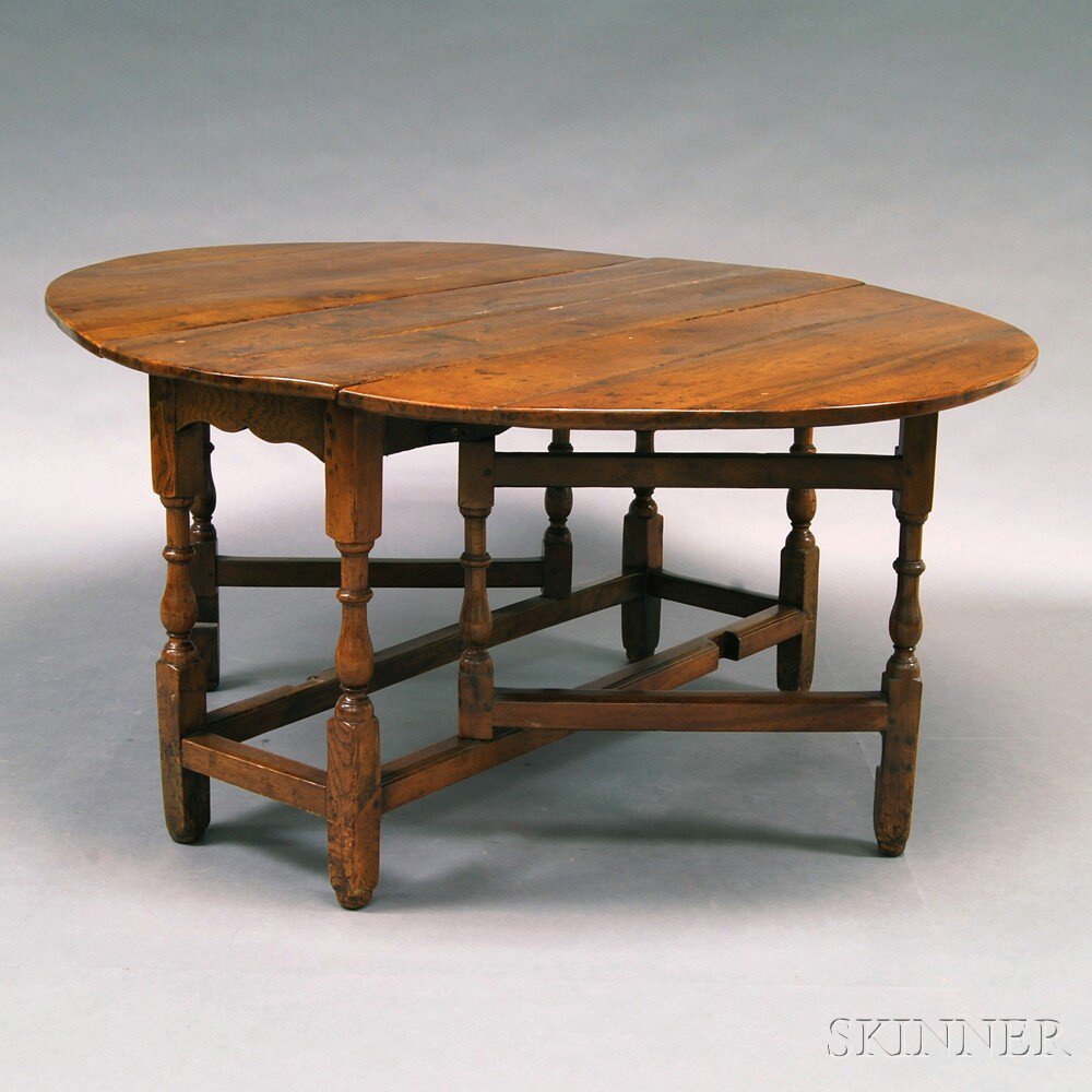 Appraisal: Walnut Drop-leaf Table probably England th th century the oval