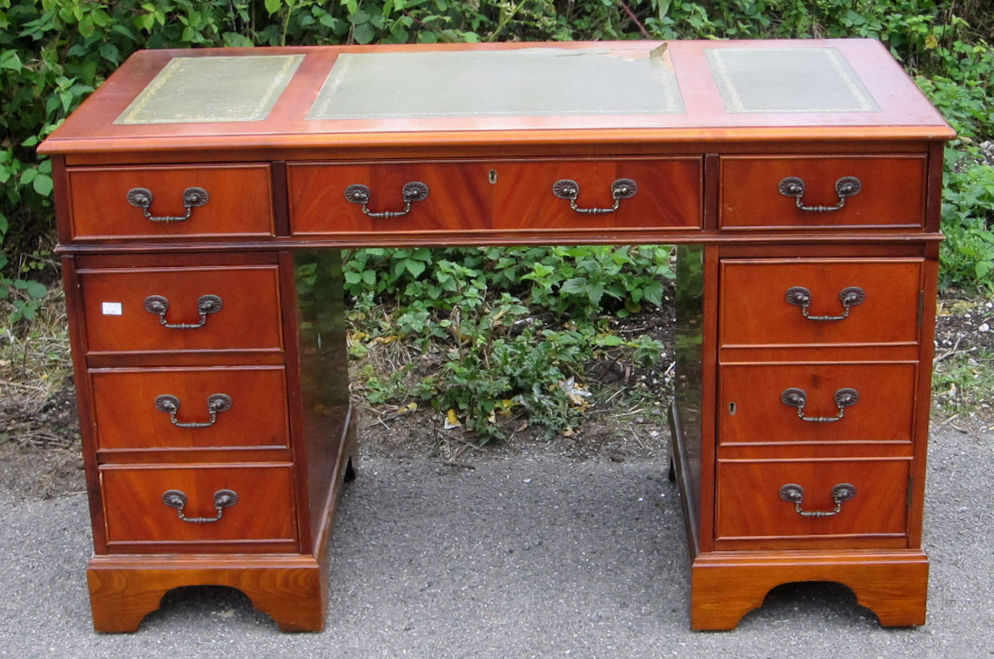 Appraisal: A modern mahogany pedestal desk