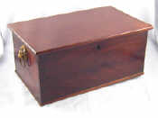 Appraisal: A mahogany box of solid dovetailed construction with oversailing lid