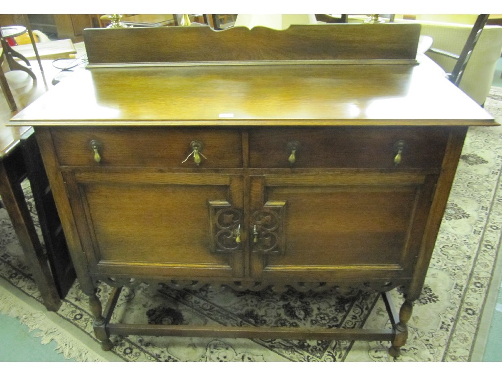 Appraisal: Oak sideboard chest of drawers and an oak cased coal