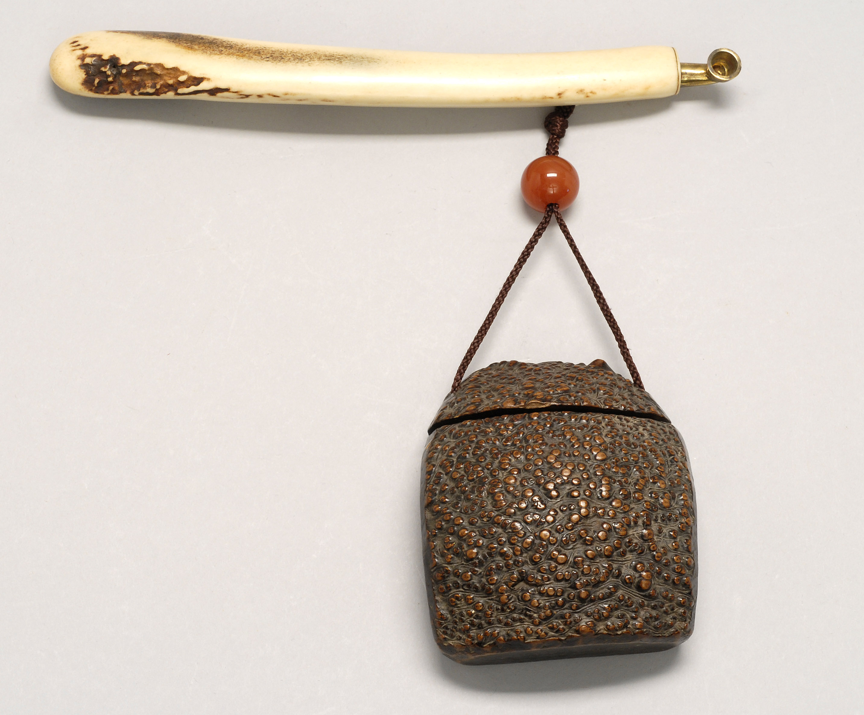 Appraisal: BURL WOOD TABAKO-BON With kiseru inside a staghorn kiseru-zutsu Tabako-bon