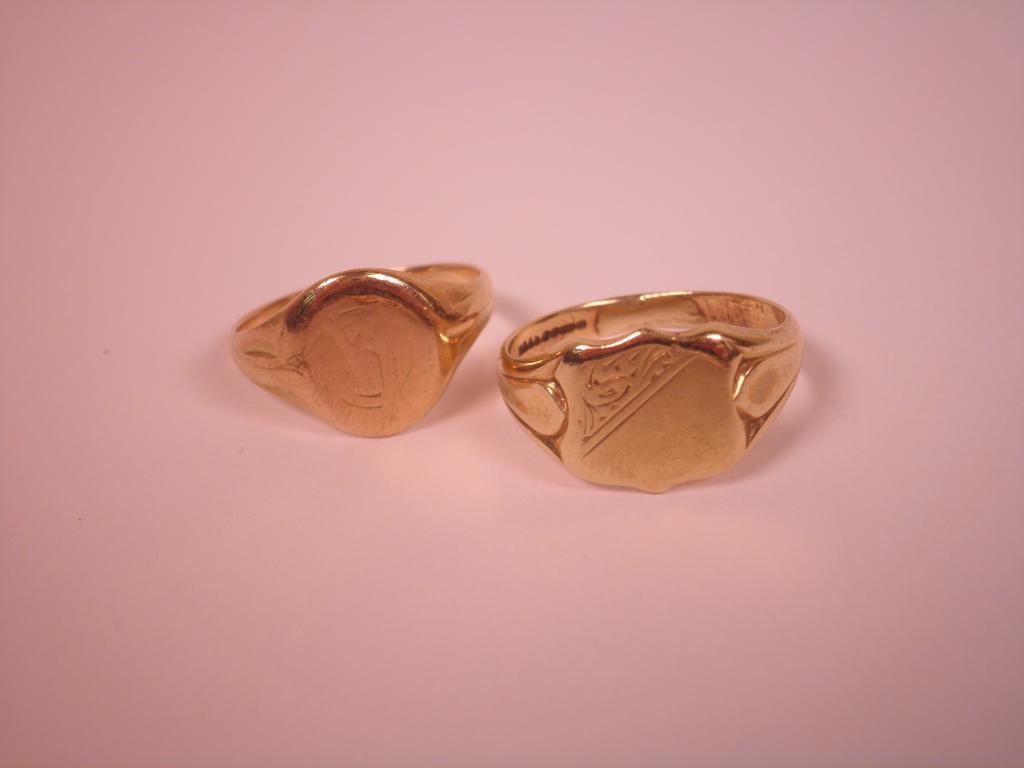 Appraisal: Two gold signet rings