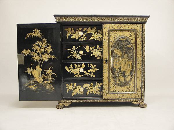 Appraisal: A Chinese export gilt decorated black lacquer table cabinet mid