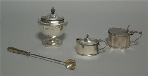 Appraisal: TWO ENGLISH SILVER MUSTARD POTS London and another crested a