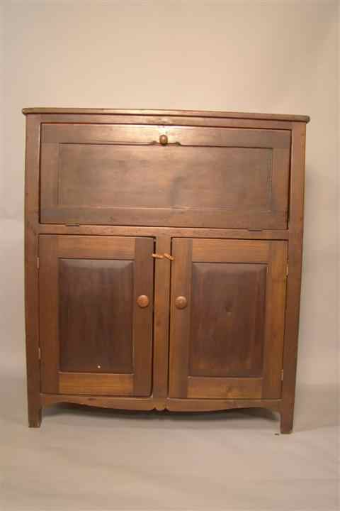 Appraisal: AMERICAN TULIP POPLAR CABINET th century the rectangular top over