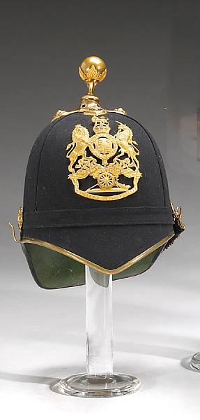 Appraisal: A British post- officer's blue cloth home service helmet of