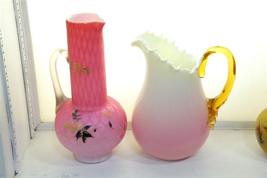 Appraisal: TWO ART GLASS PITCHERS A satin glass pitcher with free