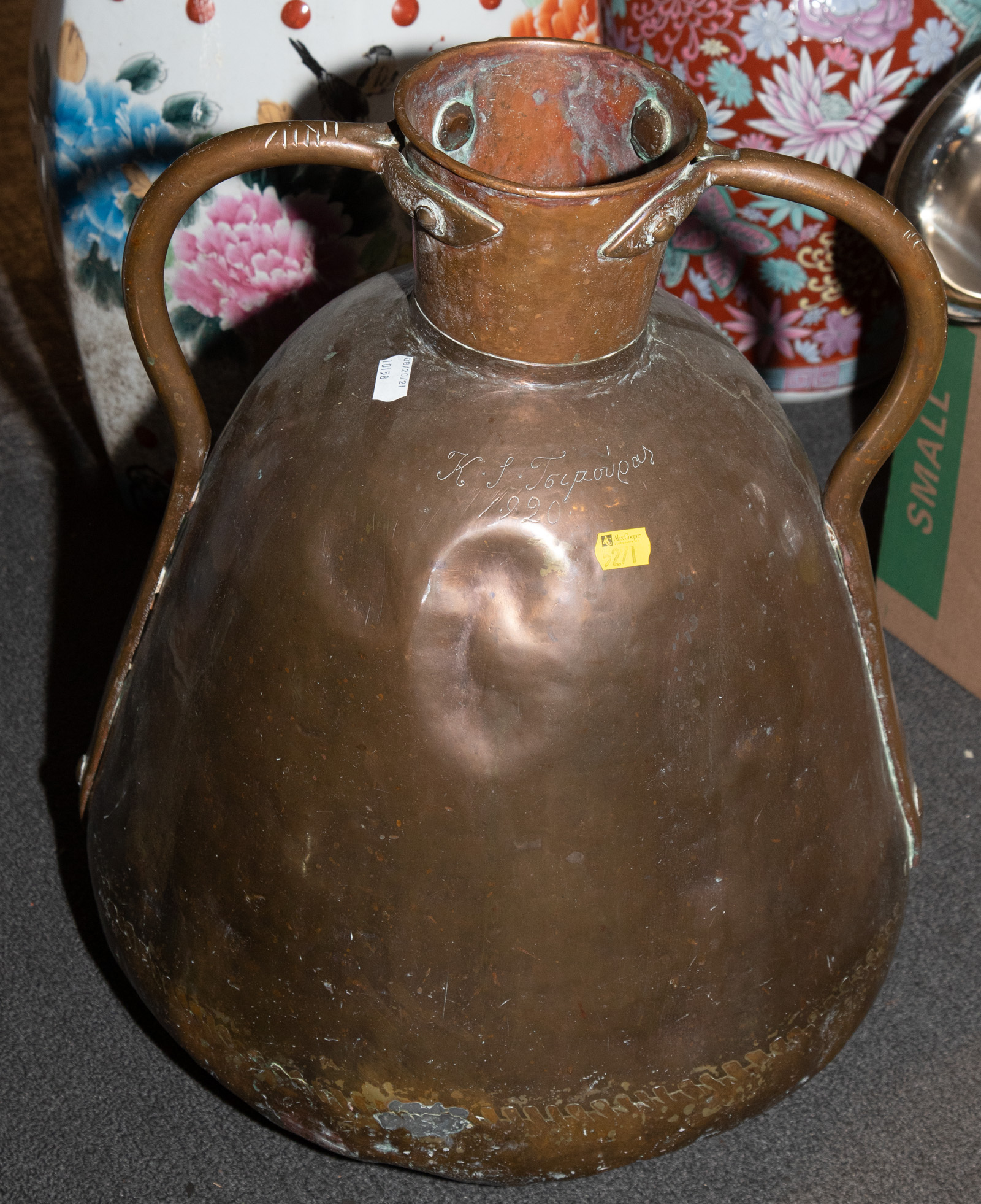 Appraisal: LARGE WROUGHT COPPER TWO-HANDLED JUG Inscribed in cyrillic characters and