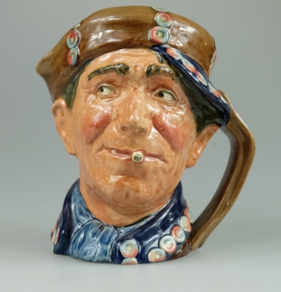 Appraisal: Royal Doulton rare large character jug Blue Pearly Boy D