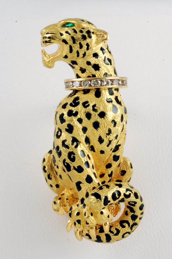 Appraisal: Jaguar diamond dress clip K yellow gold and black enamel