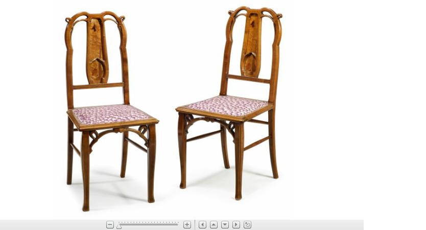 Appraisal: Pair of Leon Benouville fruitwood side chairs The shaped and