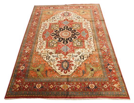 Appraisal: RUG Serapi brick field and brick palmette border accents of