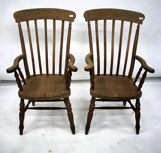 Appraisal: A PAIR OF BEECHWOOD LATHE BACK WINDSOR ARMCHAIRS cm wide