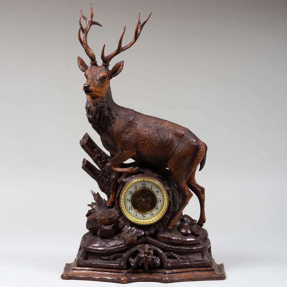 Appraisal: Black Forest Stag Form Mantel Clock Inset with glass eyes