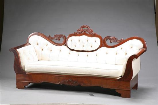 Appraisal: EMPIRE SOFA Walnut framed sofa with carved rose and foliage