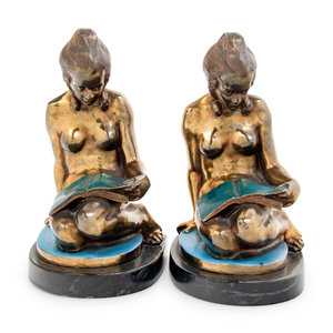 Appraisal: A Pair of Gilt Metal Figures of Seated Maidens th