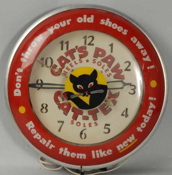 Appraisal: Cat's Paw Electric Light-Up Clock Description Working Nice image and