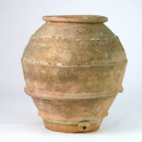 Appraisal: Oversized terracotta wine jug with incised decoration and spout dated