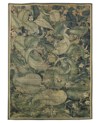 Appraisal: A Flemish late th century large leaf verdure tapestry fragment