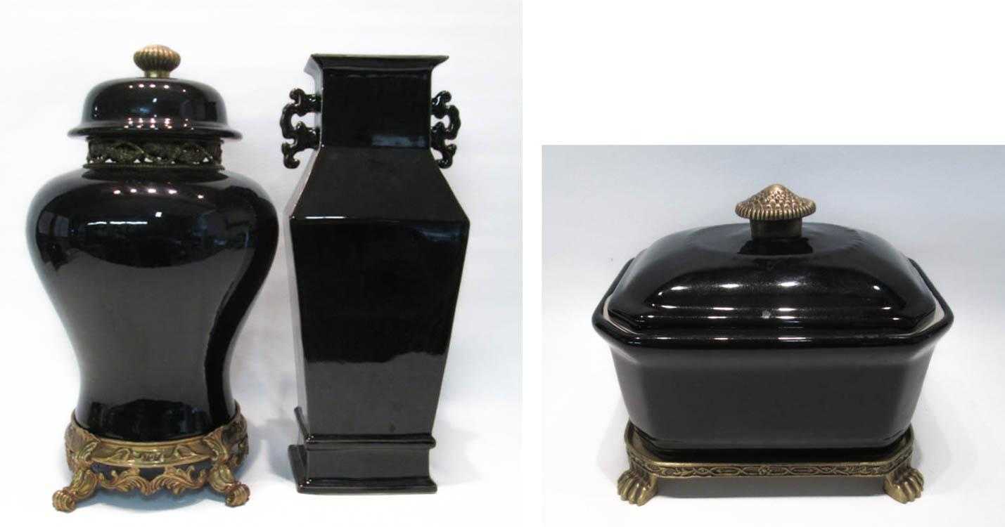 Appraisal: THREE PIECES OF BLACK GLAZED PORCELAIN including the largest lidded