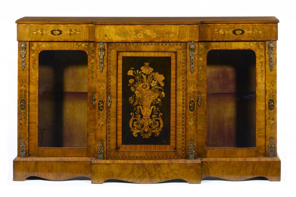 Appraisal: A VICTORIAN ORMOLU-MOUNTED WALNUT AND MARQUETRY BREAKFRONT CABINET enclosed by