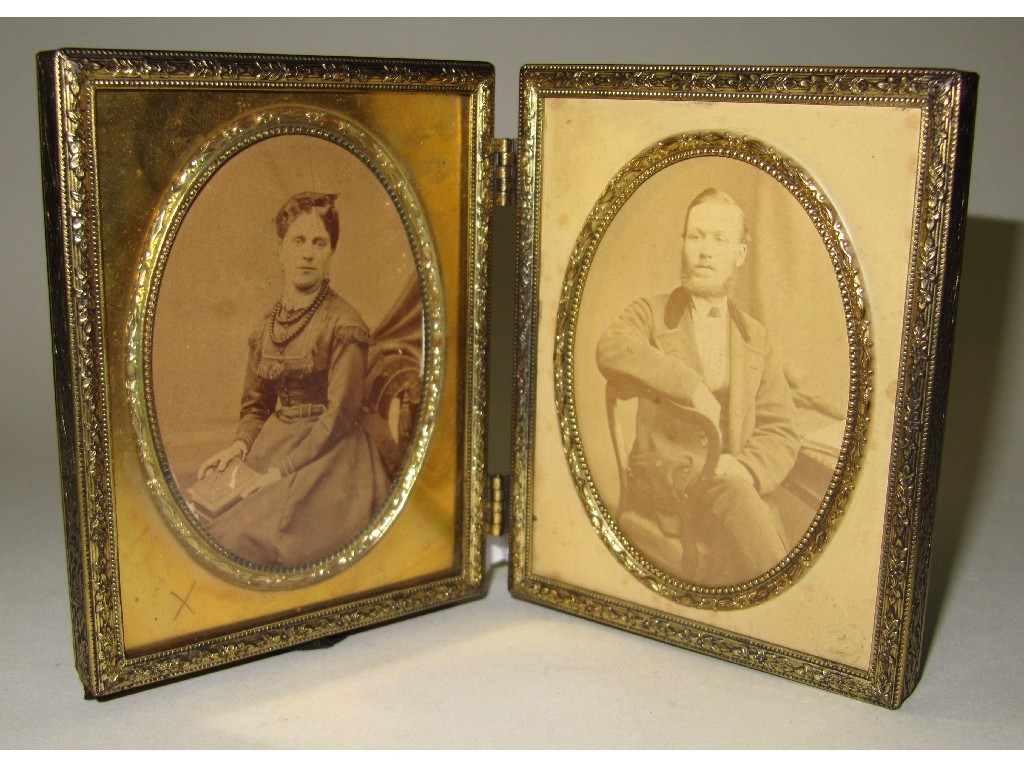 Appraisal: Pair of portrait photographs in duet frame