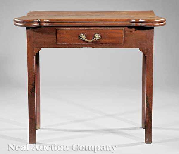 Appraisal: A Georgian Carved Mahogany Card Table th c shaped foldover