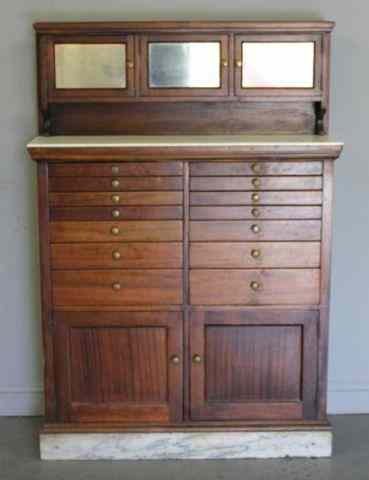 Appraisal: Antique Mahogany Dental Cabinet With milk glass shelf and lower