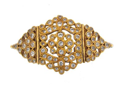 Appraisal: An Indian gold armband Pierced with foliate decoration and set