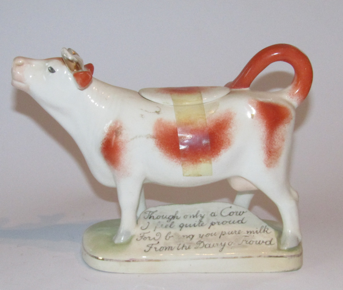 Appraisal: An early thC Royal Dux cow creamer with tail handle