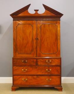 Appraisal: George III Mahogany linen press A late th century George