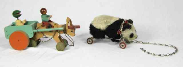 Appraisal: A Teachem Toys donkey wagon and a Merrythought toy panda