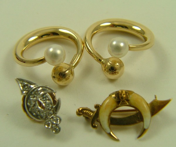 Appraisal: TWO PAIRS OF EARRINGS one K yellow gold and pearl