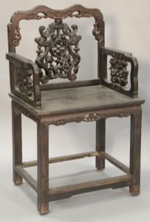 Appraisal: Chinese hardwood armchair with carved back and sides ht in