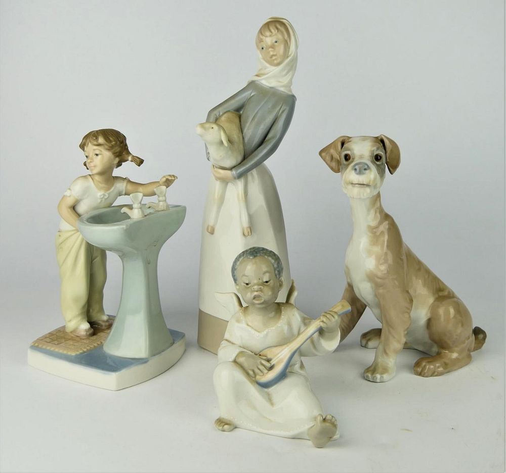 Appraisal: LOT OF FOUR SPANISH GLAZED PORCELAIN FIGURES A lot of