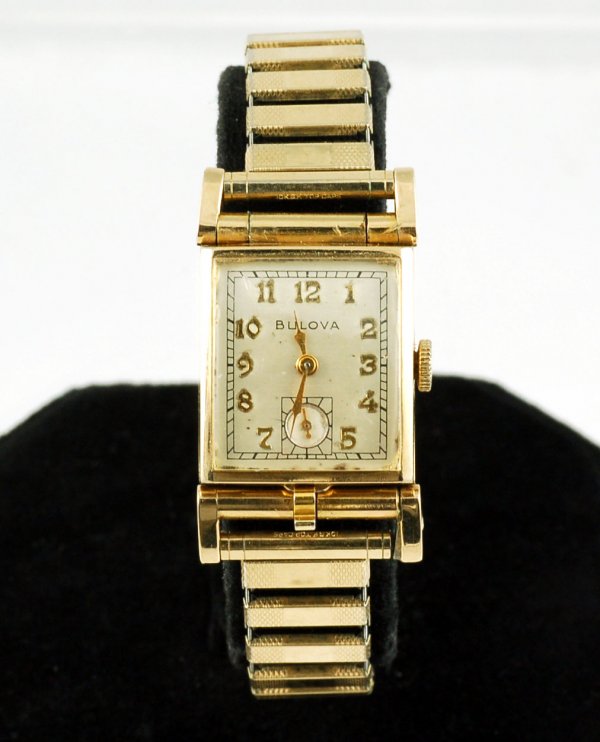 Appraisal: Man's Bulova goldfilled wristwatch with locket type case K rolled