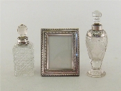 Appraisal: An Edwardian silver-mounted cut glass scent bottle Birmingham ovoid with