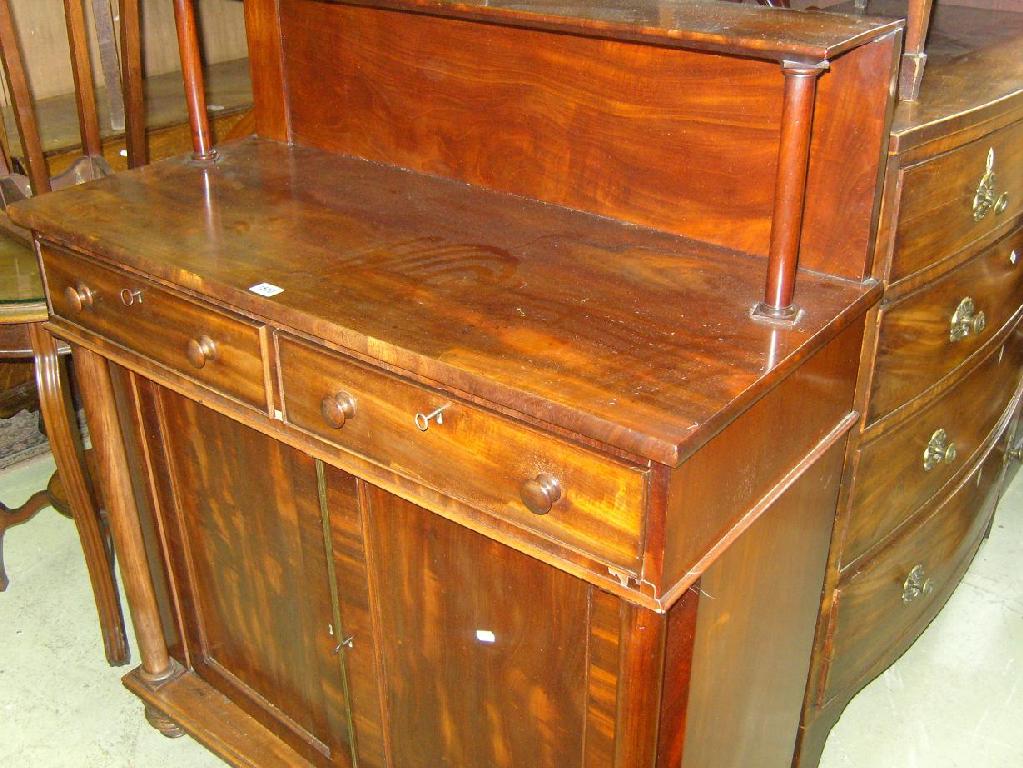 Appraisal: A Regency mahogany chiffonier the lower section enclosed by two