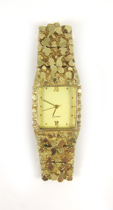 Appraisal: QUARTZ WATCH MOUNTED IN FOURTEEN KARAT GOLD NUGGET BAND men's