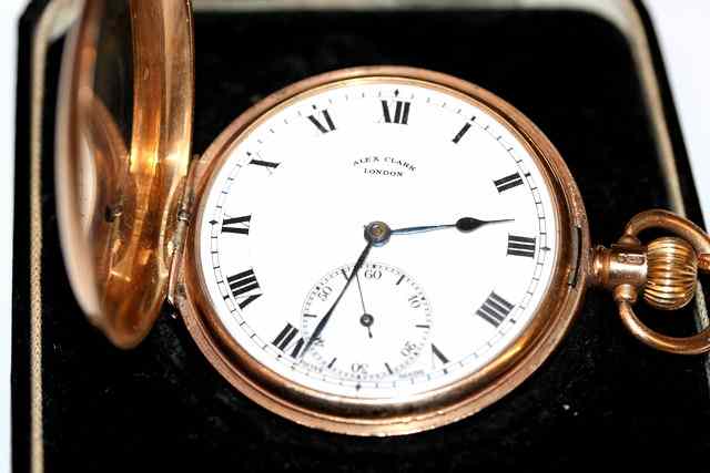 Appraisal: A CT GOLD CASED HUNTER POCKET WATCH with white enamel