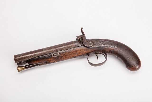 Appraisal: A GEORGIAN DOUBLE BARRELLED PERCUSSION CAP PISTOL with walnut stock