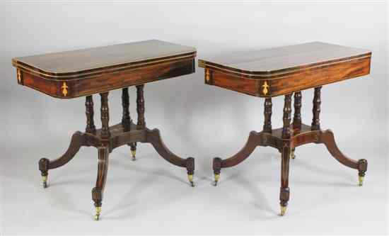 Appraisal: A pair of Regency rosewood crossbanded and inlaid mahogany card