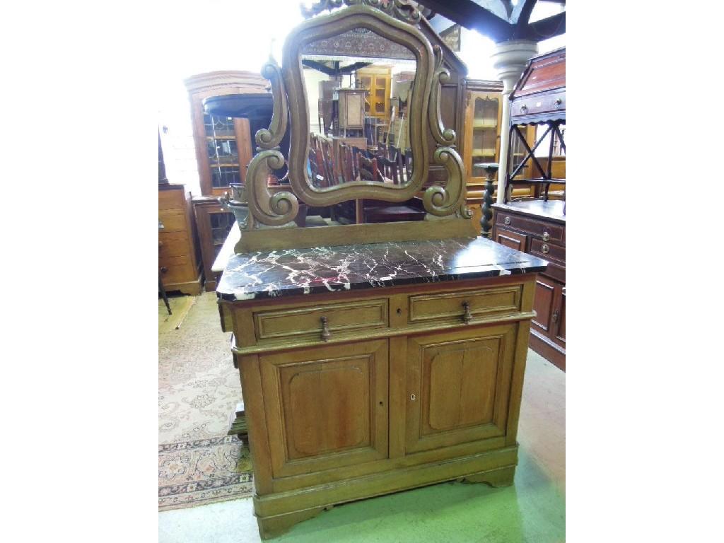 Appraisal: A th century oak washstand the lower section enclosed by