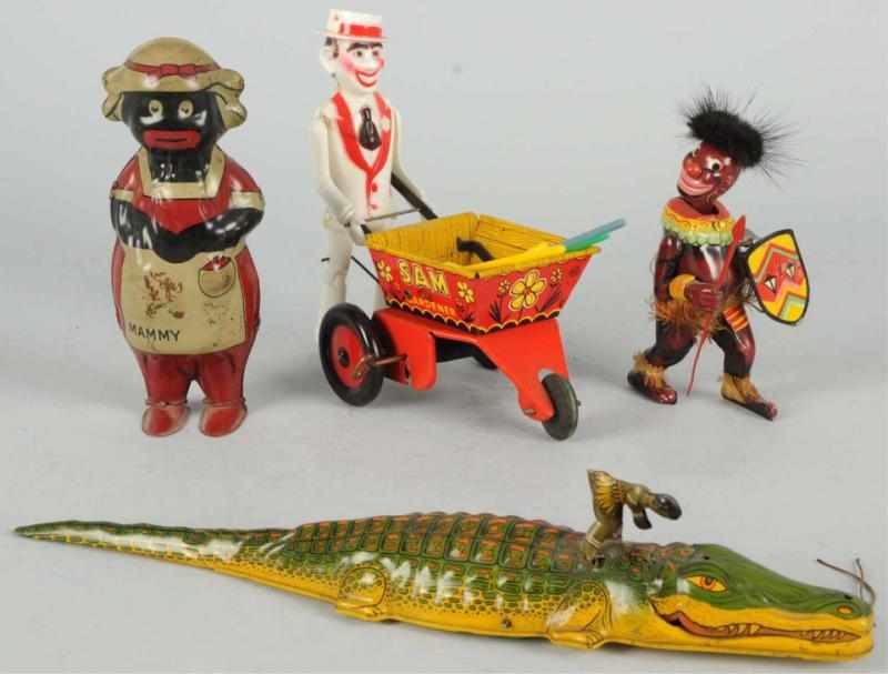 Appraisal: Lot of Tin Litho African-American Themed Toys Wind-up mechanisms are