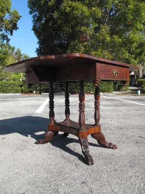 Appraisal: Late th century American Empire style mahogany library table having