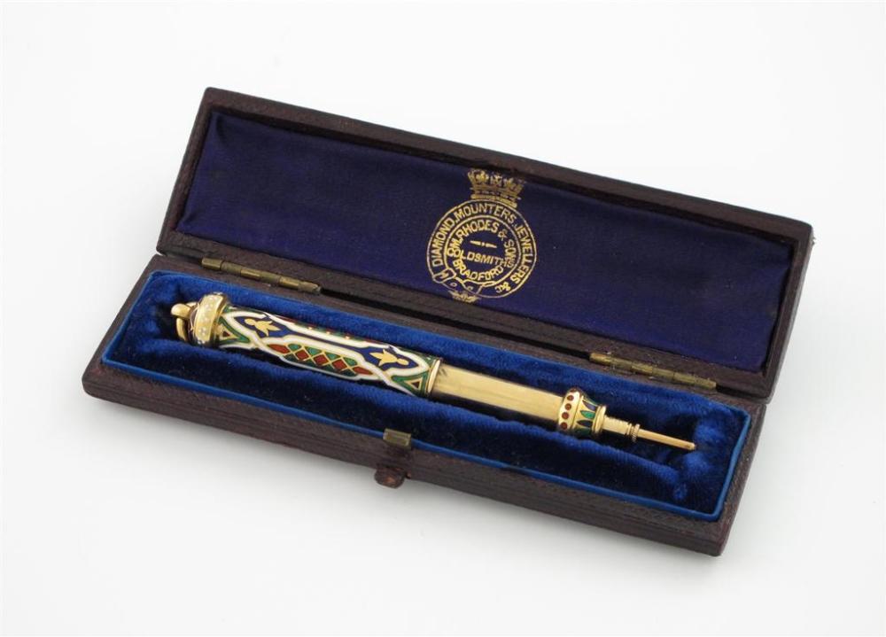 Appraisal: A Victorian carat gold and enamel retractable pencil