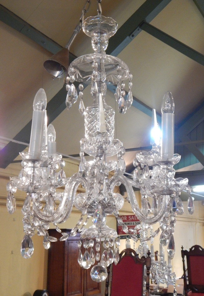 Appraisal: A Venetian style six branch chandelier suspended with various shaped