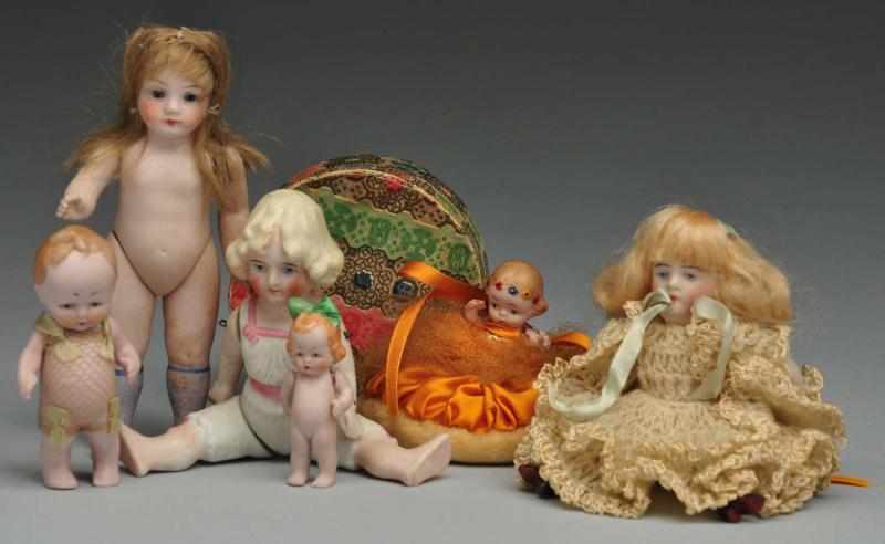 Appraisal: Lot of All Bisque Dolls Description Pink all-bisque character in