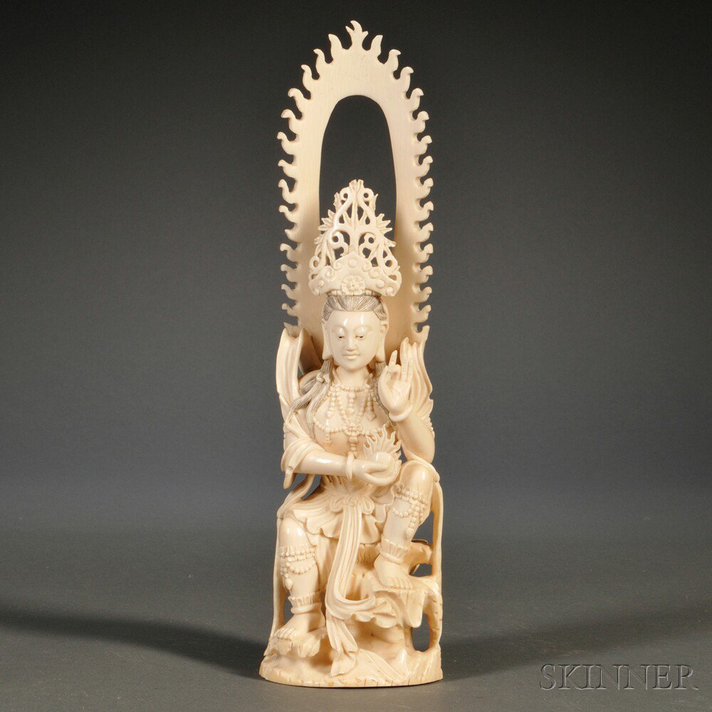 Appraisal: Ivory Carving of a Buddhist Goddess China sitting dressed in