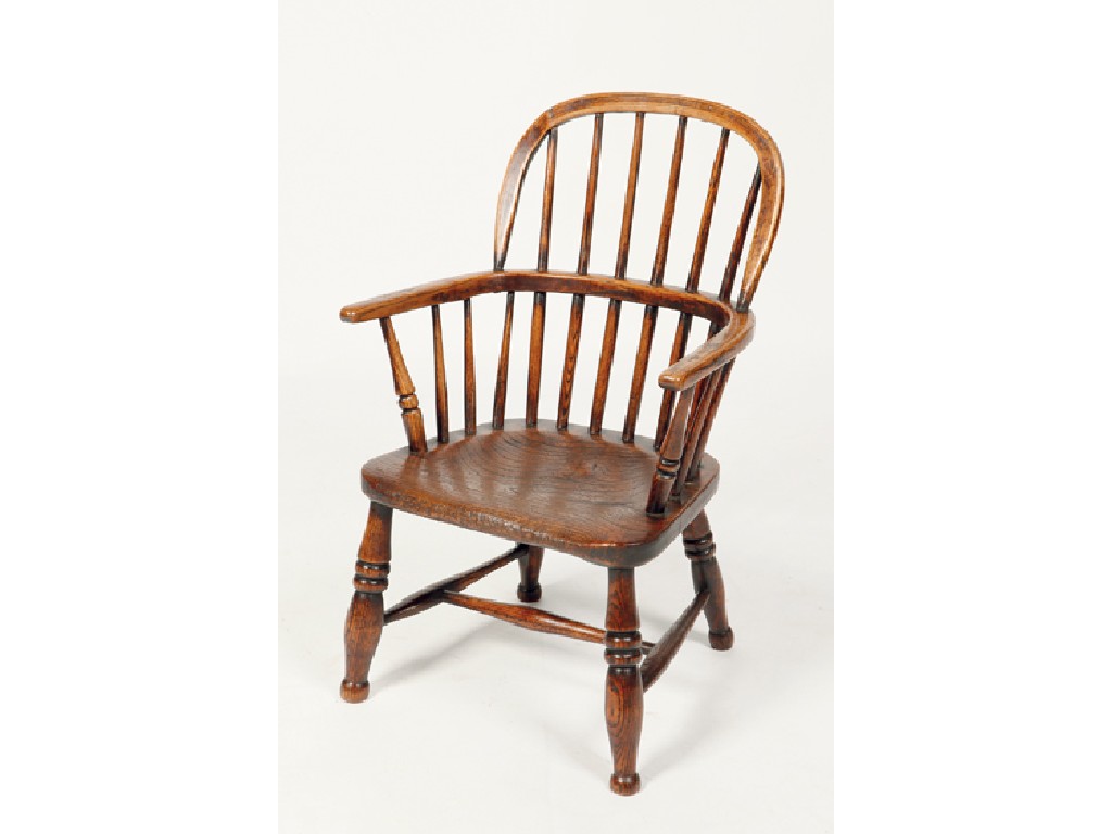 Appraisal: A CHILD'S HOOP BACK WINDSOR ARMCHAIR with beech uprights and